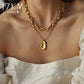 Gold-Polished Alloy Layered Designer Short Necklace - The Pari | Swadesiicart