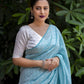 Sky Blue Poly Georgette Woven Design Saree with Unstitched Blouse - Hiral Fashion | Swadesiicart