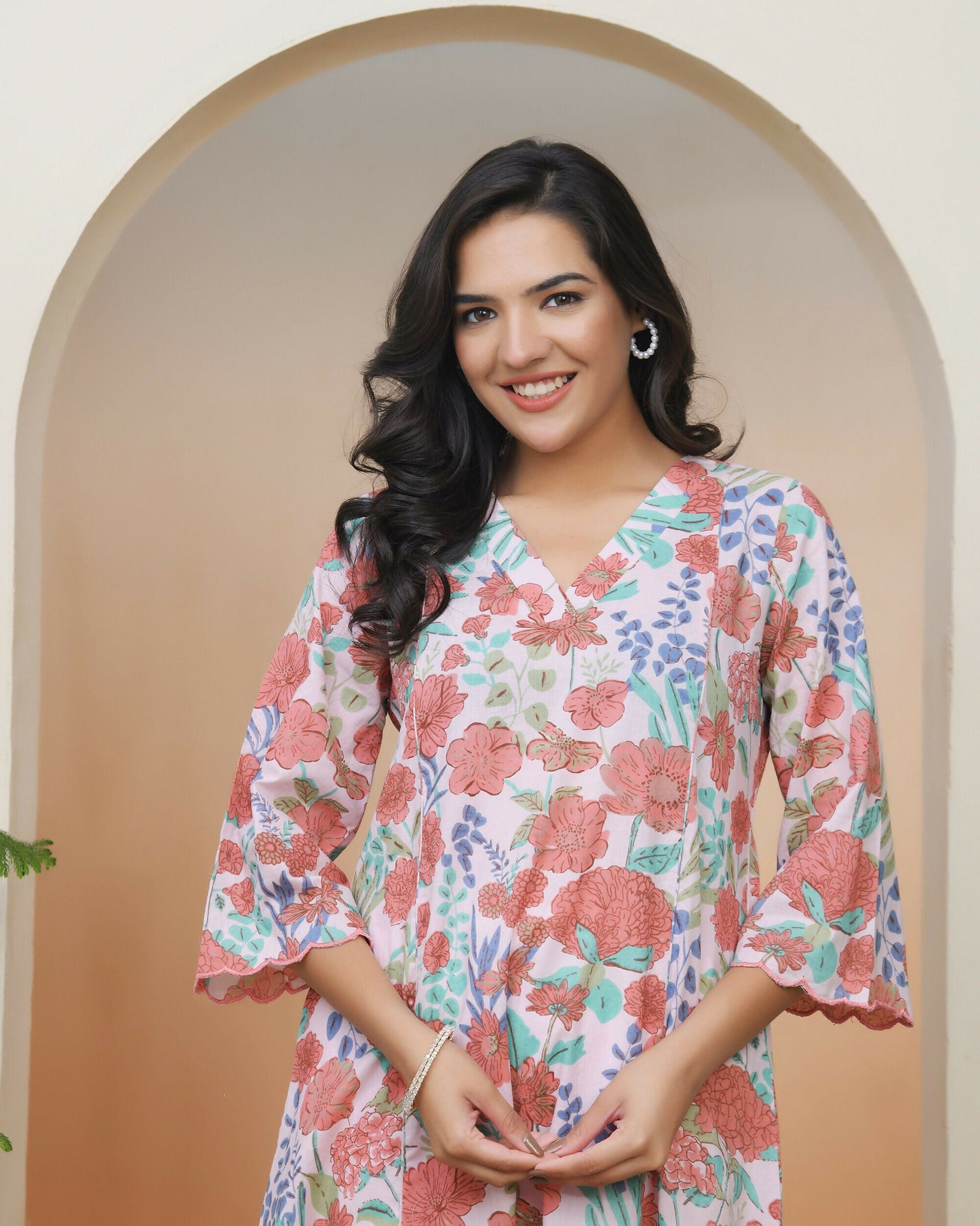 Vaasva Women Peach Floral Cotton Printed Flare Kurti With Pant | Swadesiicart