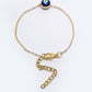 NVR Women Gold-Toned Evil Eye Rakhi With Roli Chawal - Swadesiicart