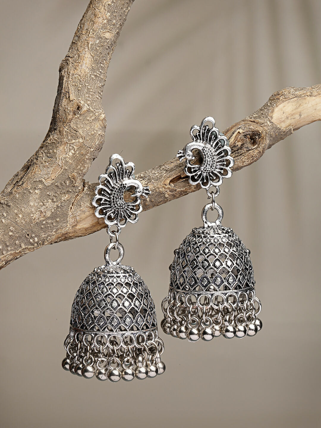 NVR Women's Silver-Toned Peacock Design German Silver Oxidised Dome Shaped Jhumka Earrings | Swadesiicart