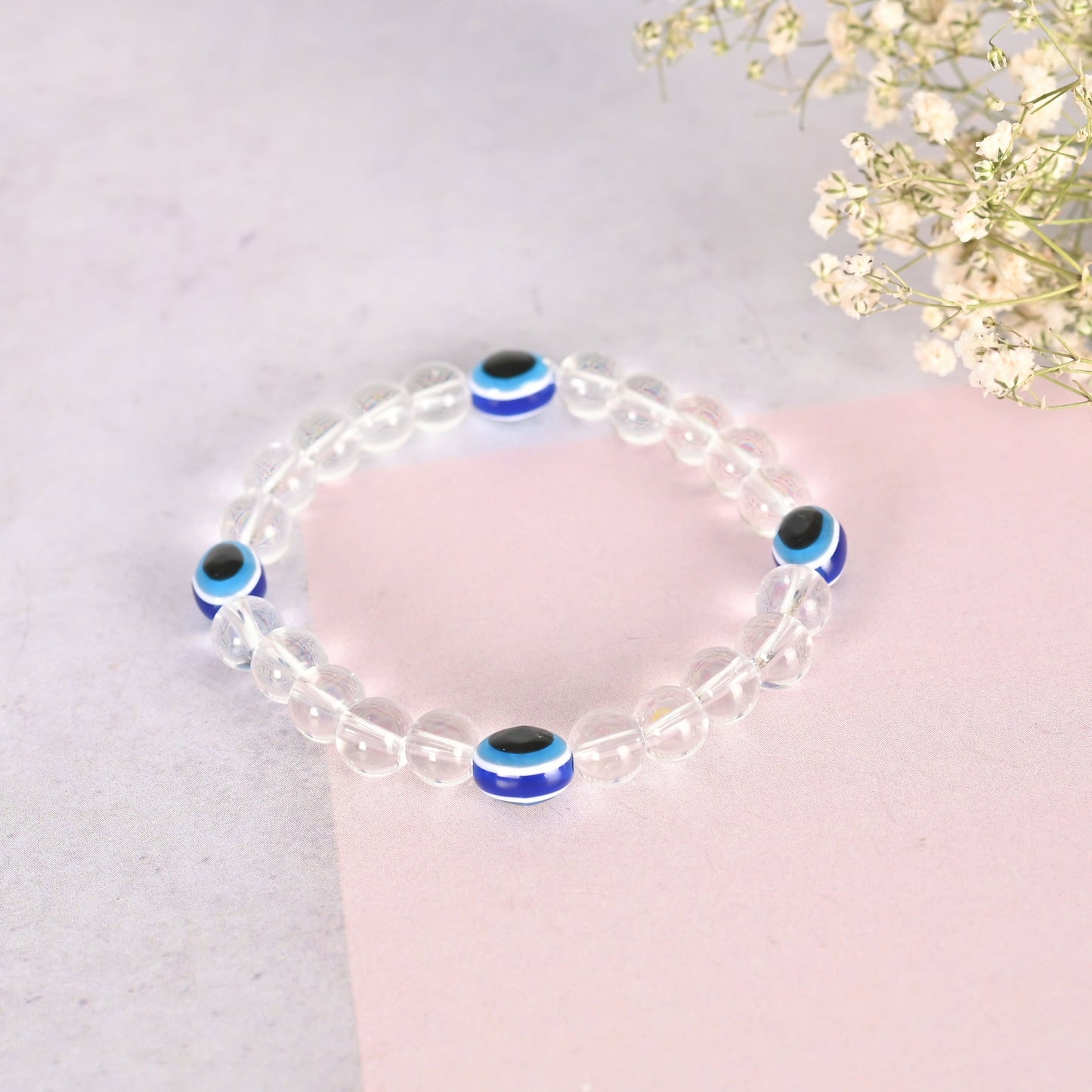 NVR Men & Women Evil Eyetransparent Beaded Elasticated Bracelet - Swadesiicart