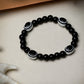 NVR Women & Men Black Evil Eye Elasticated Rakhi With Roli Chawal - NR Retail-NVR