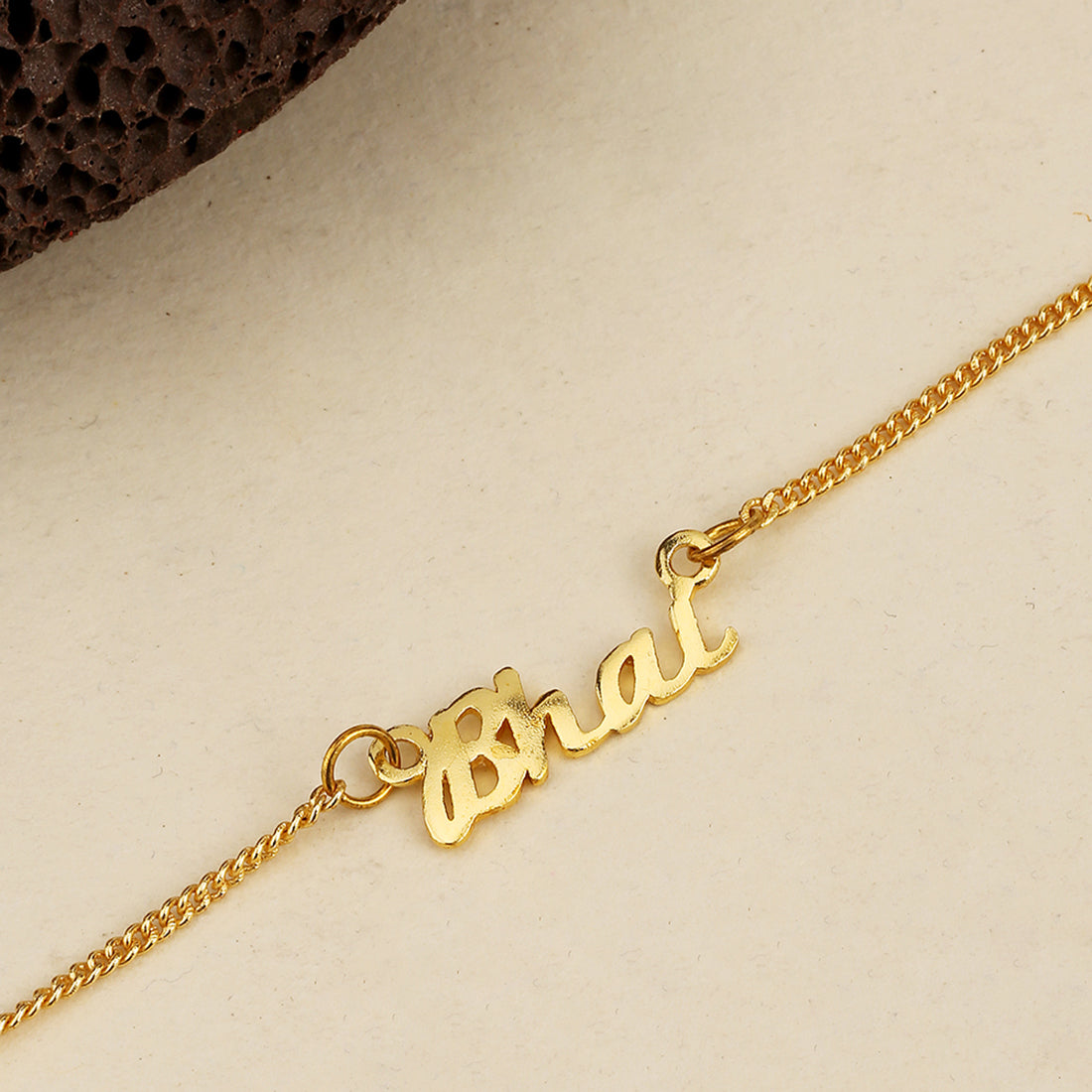 trueBrowns X Voylla Gold-Toned 'Bhai' Bracelet Rakhi With Roli Chaawal Pack | Swadesiicart