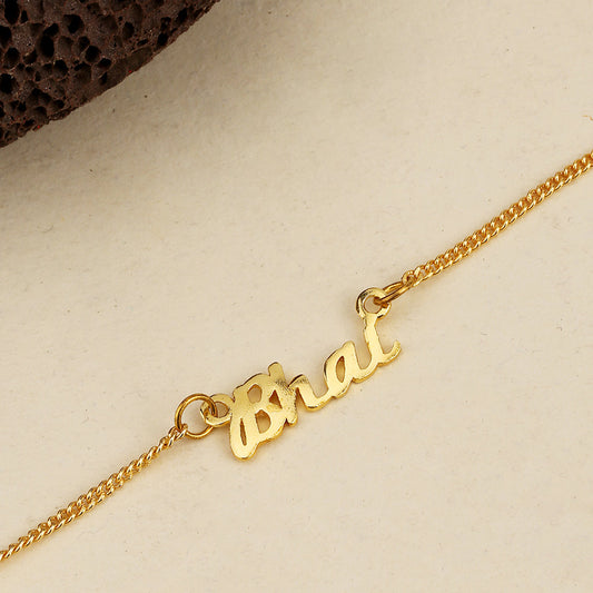 trueBrowns X Voylla Gold-Toned 'Bhai' Bracelet Rakhi With Roli Chaawal Pack | Swadesiicart