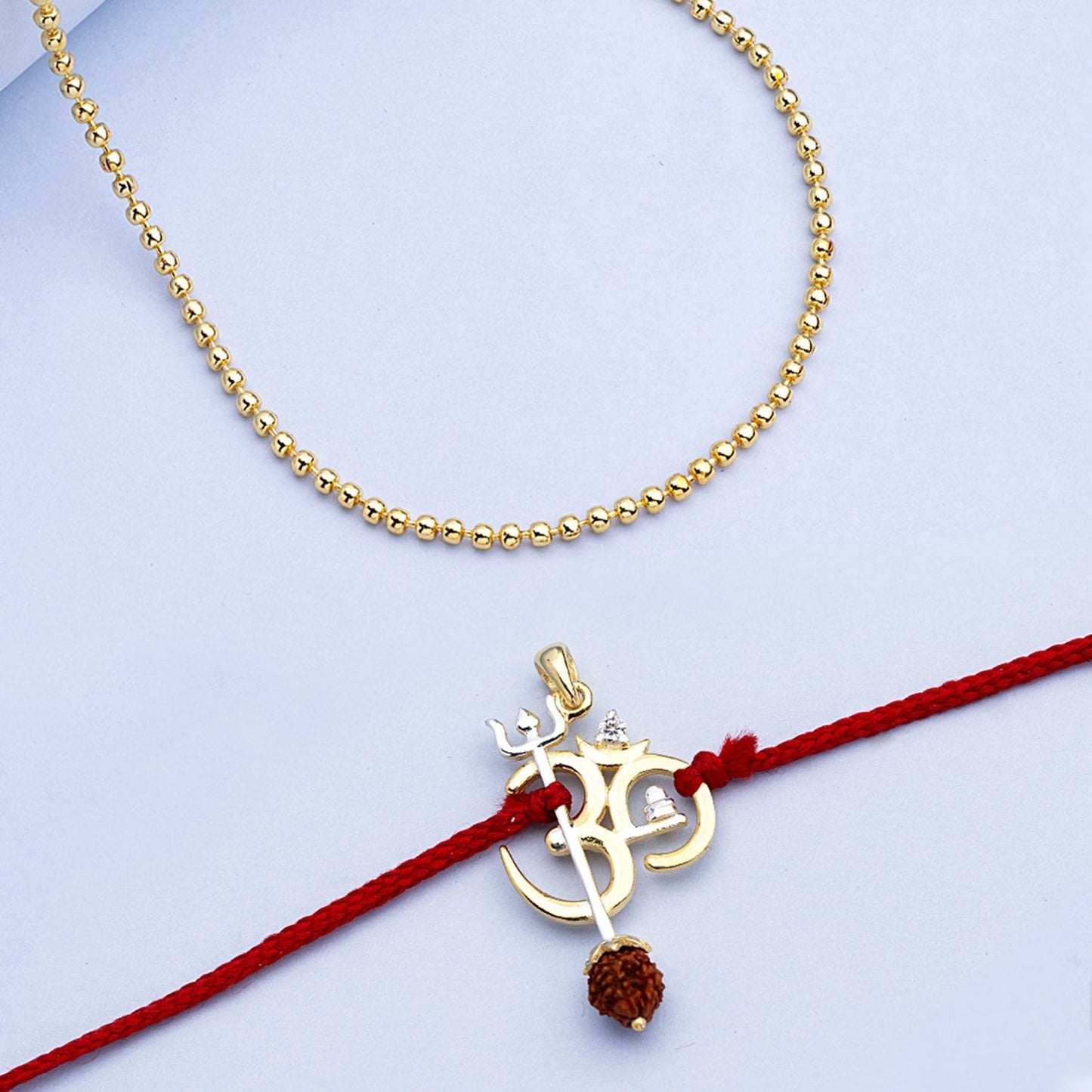 trueBrowns X Voylla OM' Design with Rudraksh Rakhi-Pendant | Swadesiicart