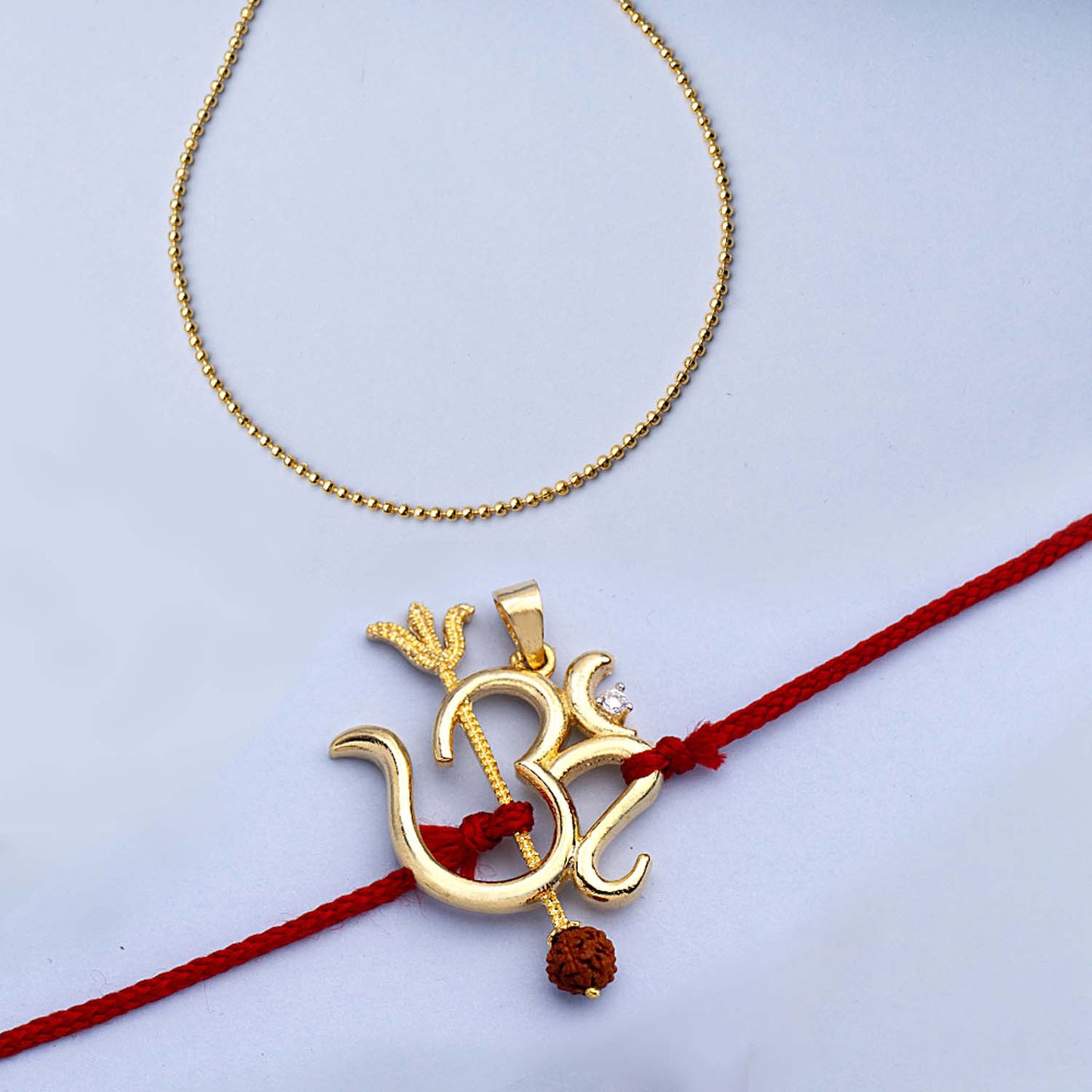 trueBrowns X Voylla Rudraksha Studded 'OM' Rakhi-Pendant | Swadesiicart