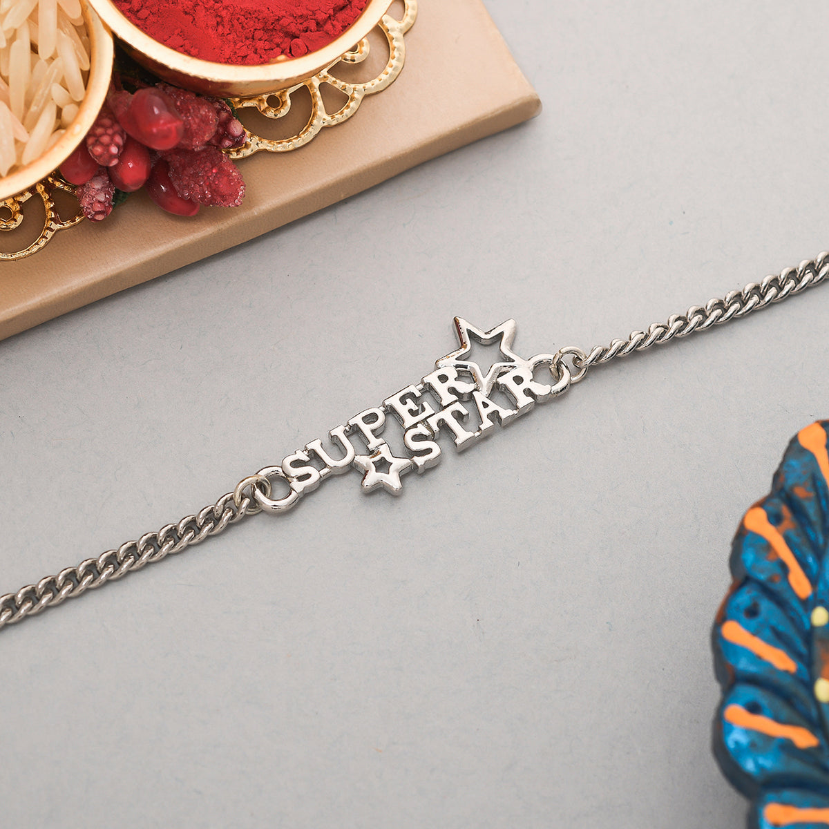 trueBrowns X Voylla Stylish Silver Plated Super Star Bracelet Rakhi | Swadesiicart