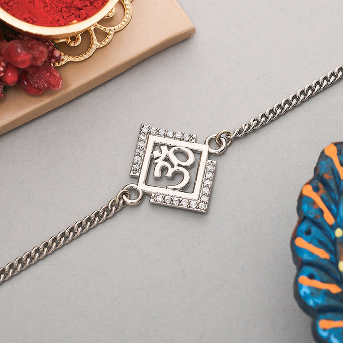 trueBrowns Auspicious OM Silver Plated Bracelet Rakhi | Swadesiicart