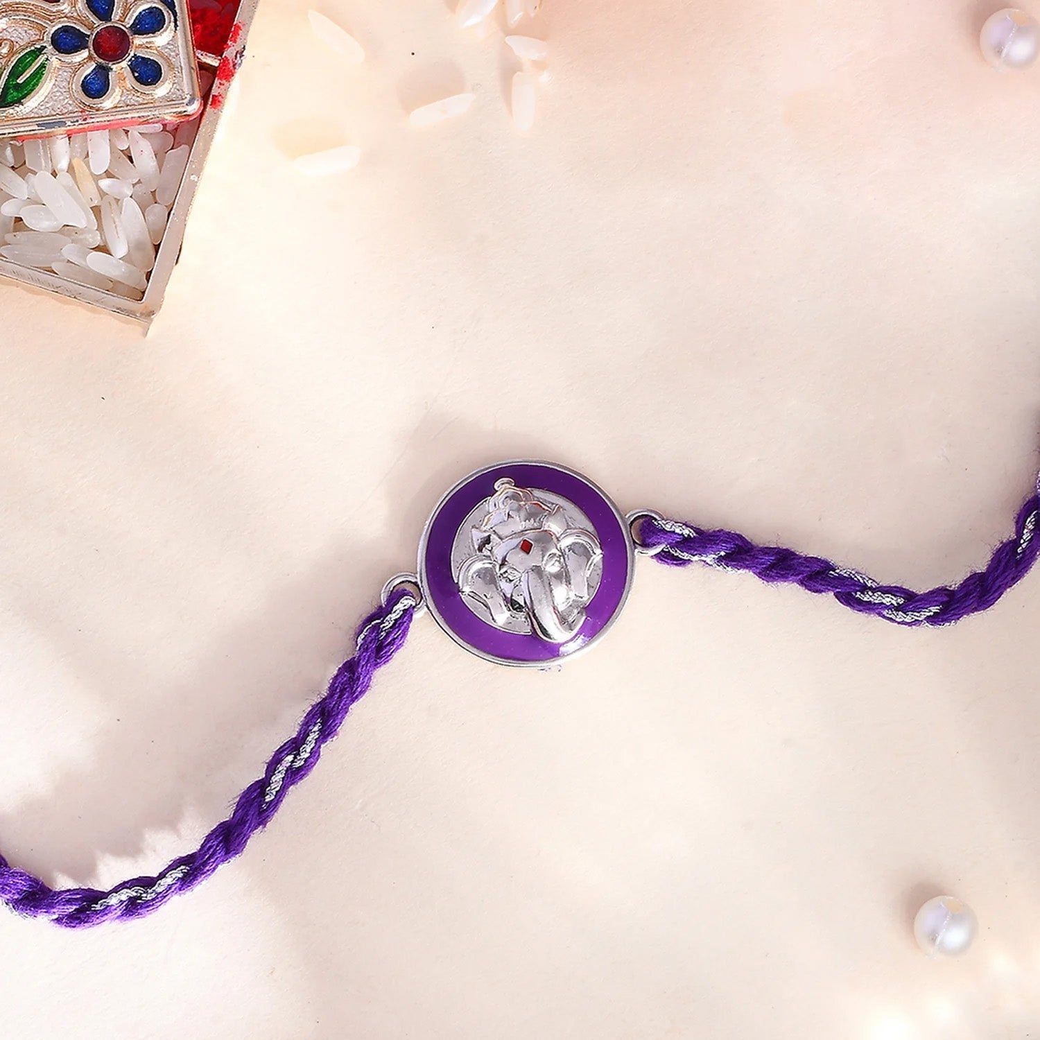 trueBrowns Sterling Silver Purple Ganesha Rakhi | Swadesiicart