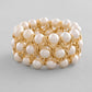 VOJ Women White and Gold Toned Perals Gold-Polished Multi Strand Bracelet - Swadesiicart
