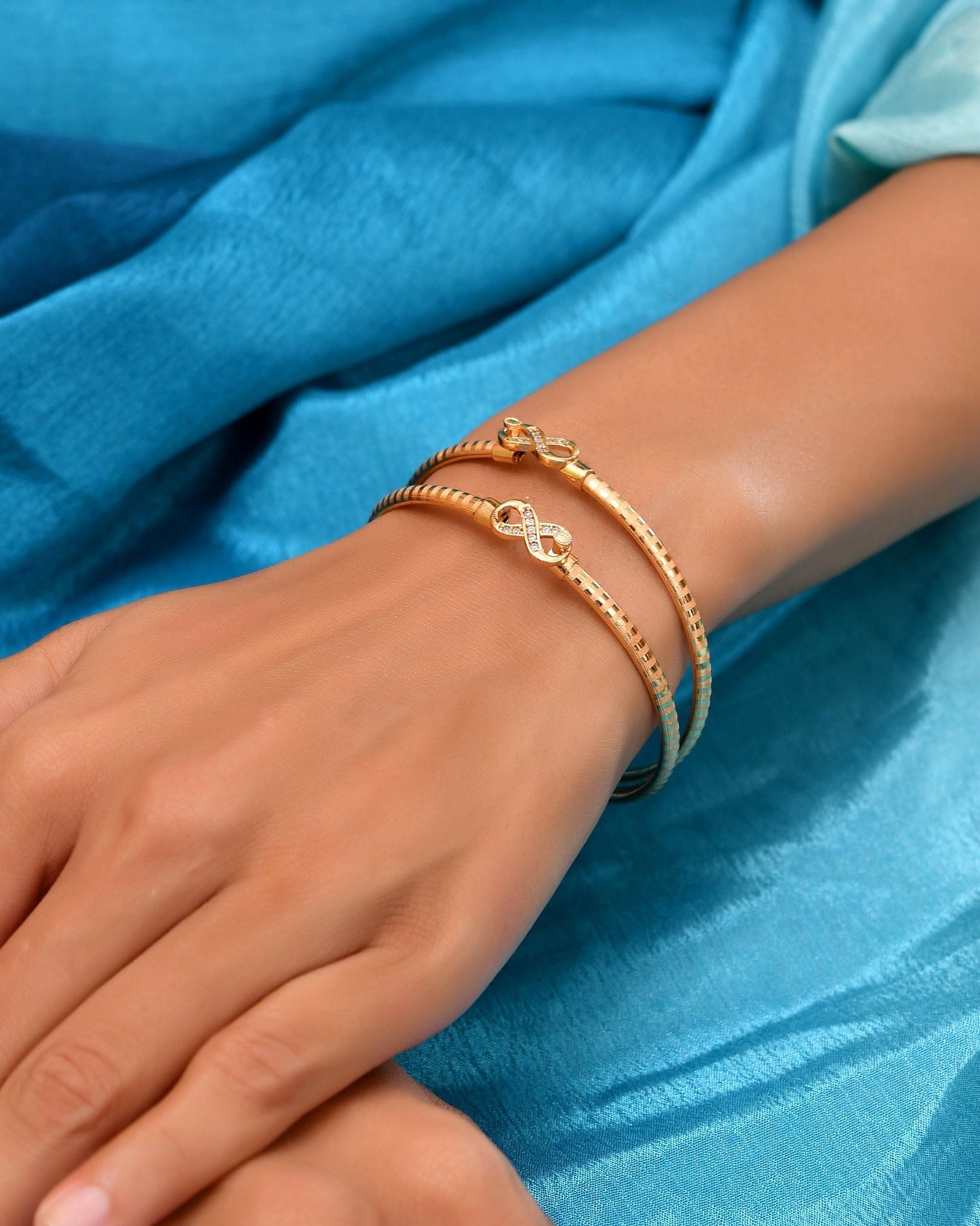 VOJ Set Of 2 Gold Polished AD Studded Infinite Shaped Bangles - Swadesiicart
