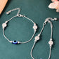 VOJ Set of 2 Silver Plated Evil Eye Bead Studded Stainless Steel Anklet - Swadesiicart