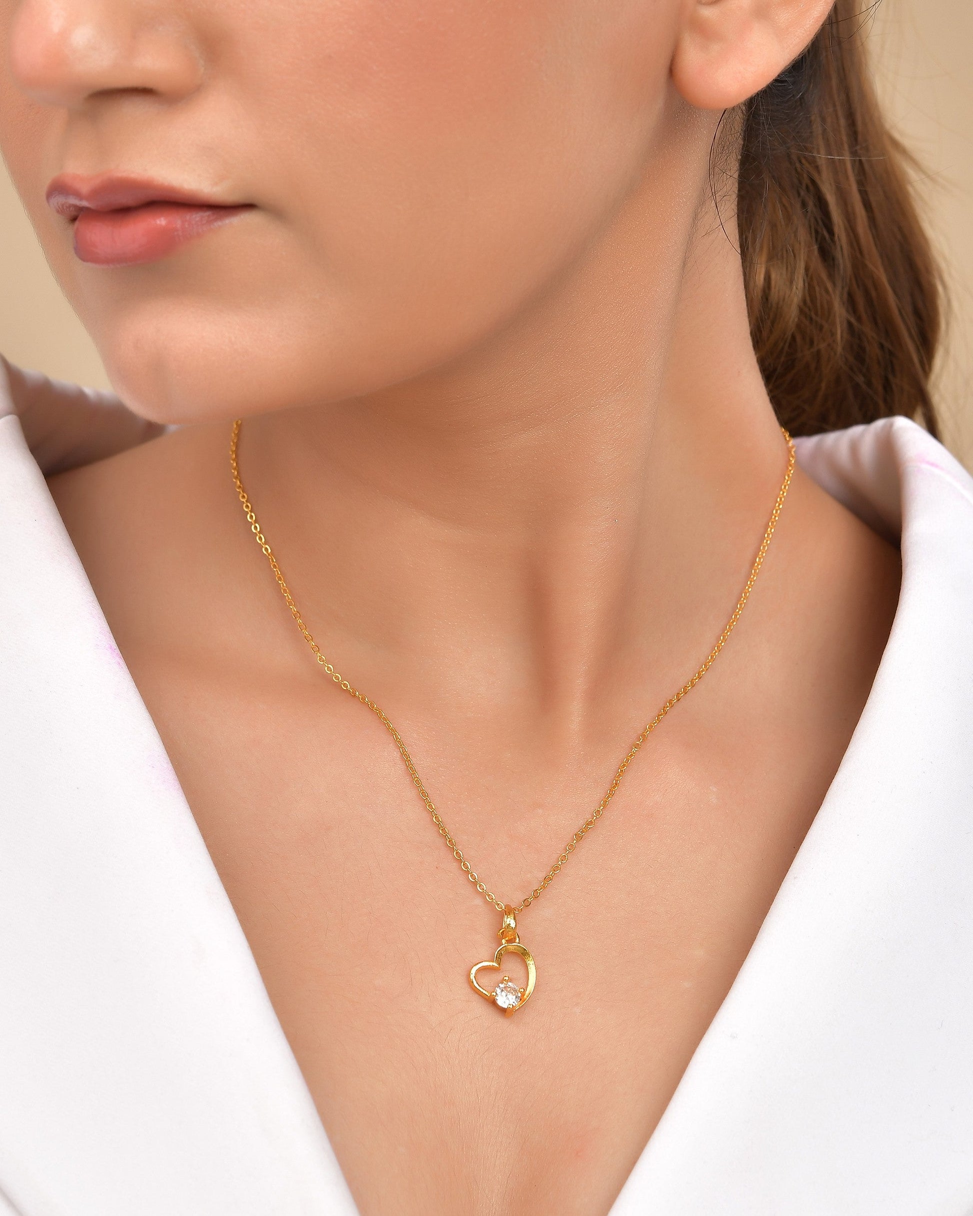 VOJ Gold Polished Chain With Heart Shaped Stone Studded Pendant - Swadesiicart