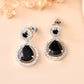 VOJ Silver Plated Black Stone Studded Teardrop Shaped Earrings - Swadesiicart
