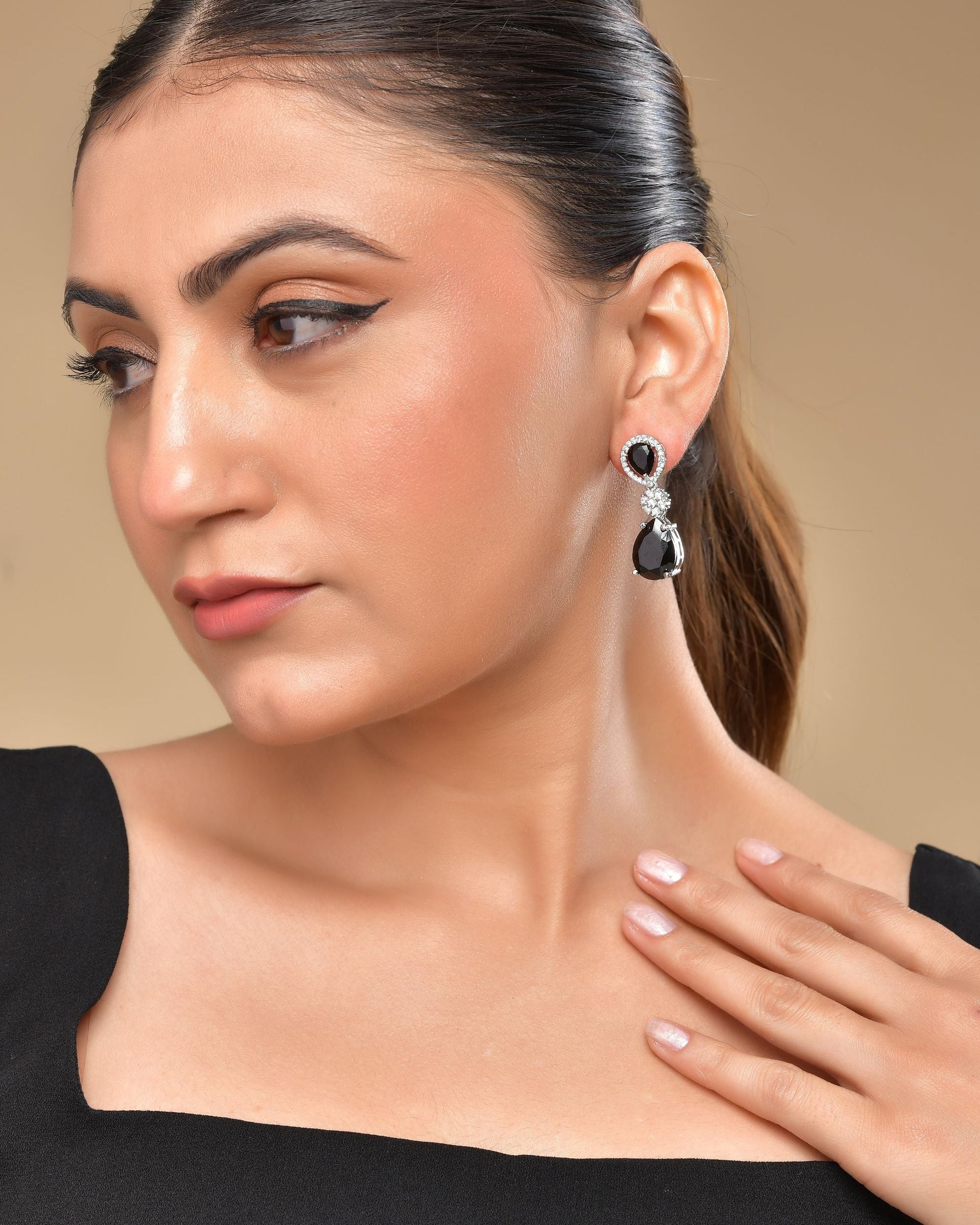 VOJ Silver Plated Black Stone Studded Floral Shaped Studs Earrings - Swadesiicart