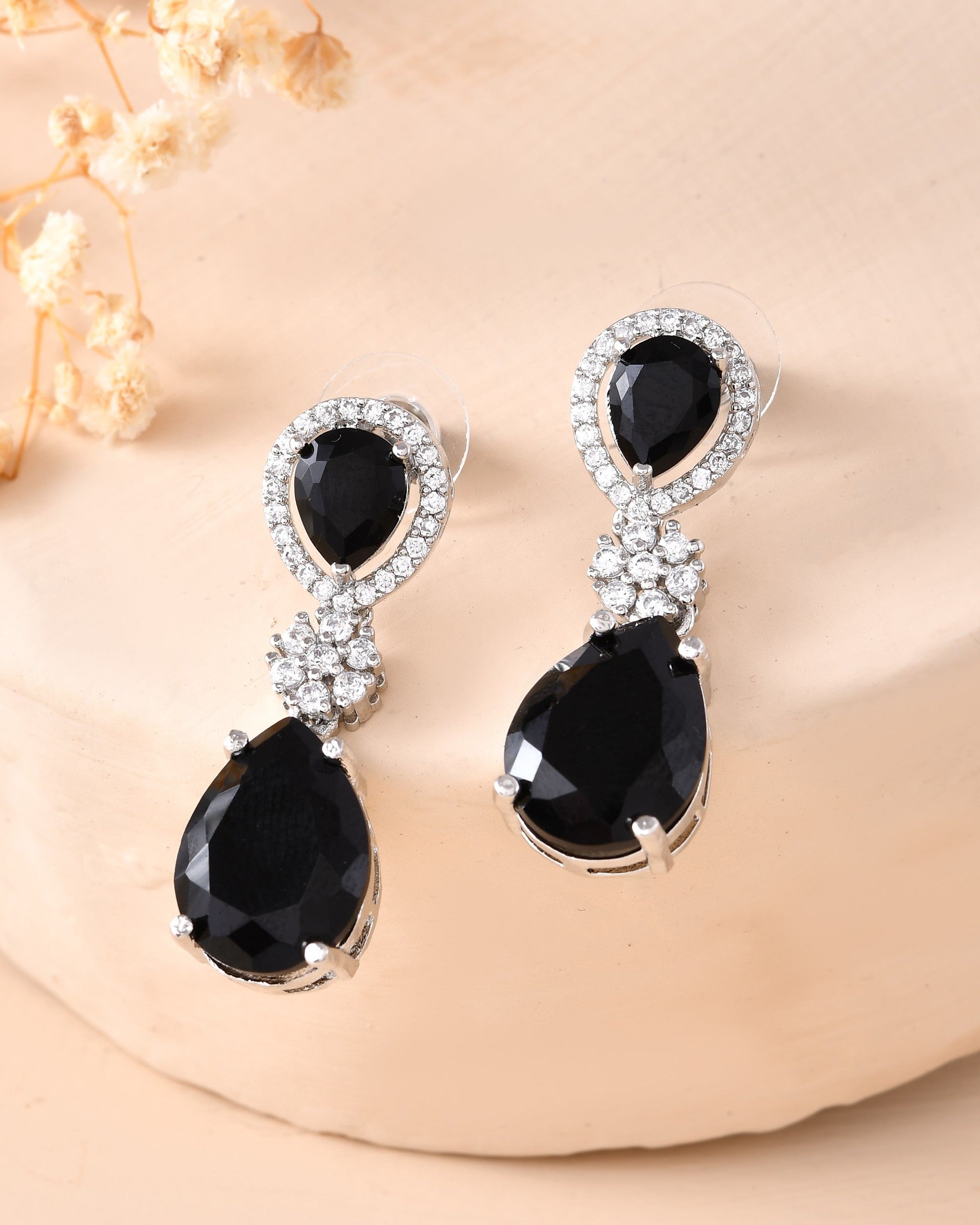 VOJ Silver Plated Black Stone Studded Floral Shaped Studs Earrings - Swadesiicart
