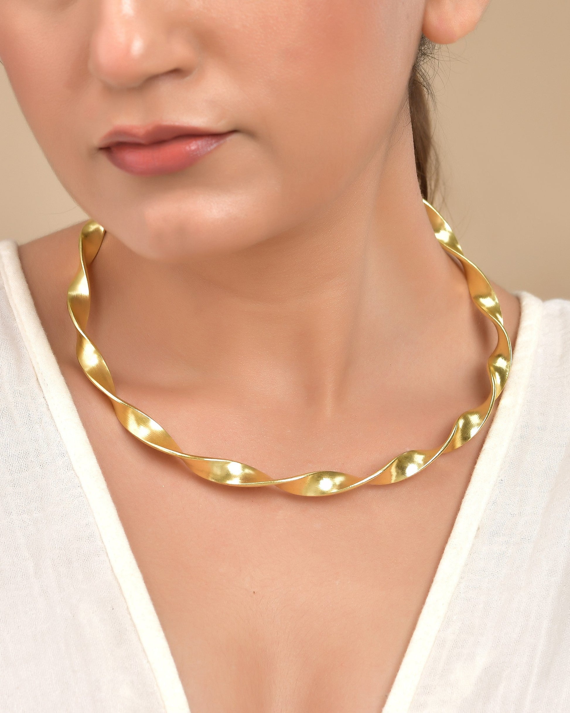 VOJ Gold Polished Anti Tarnished Twisted Hasli Necklace | Swadesiicart