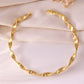 VOJ Gold Polished Anti Tarnished Twisted Hasli Necklace | Swadesiicart