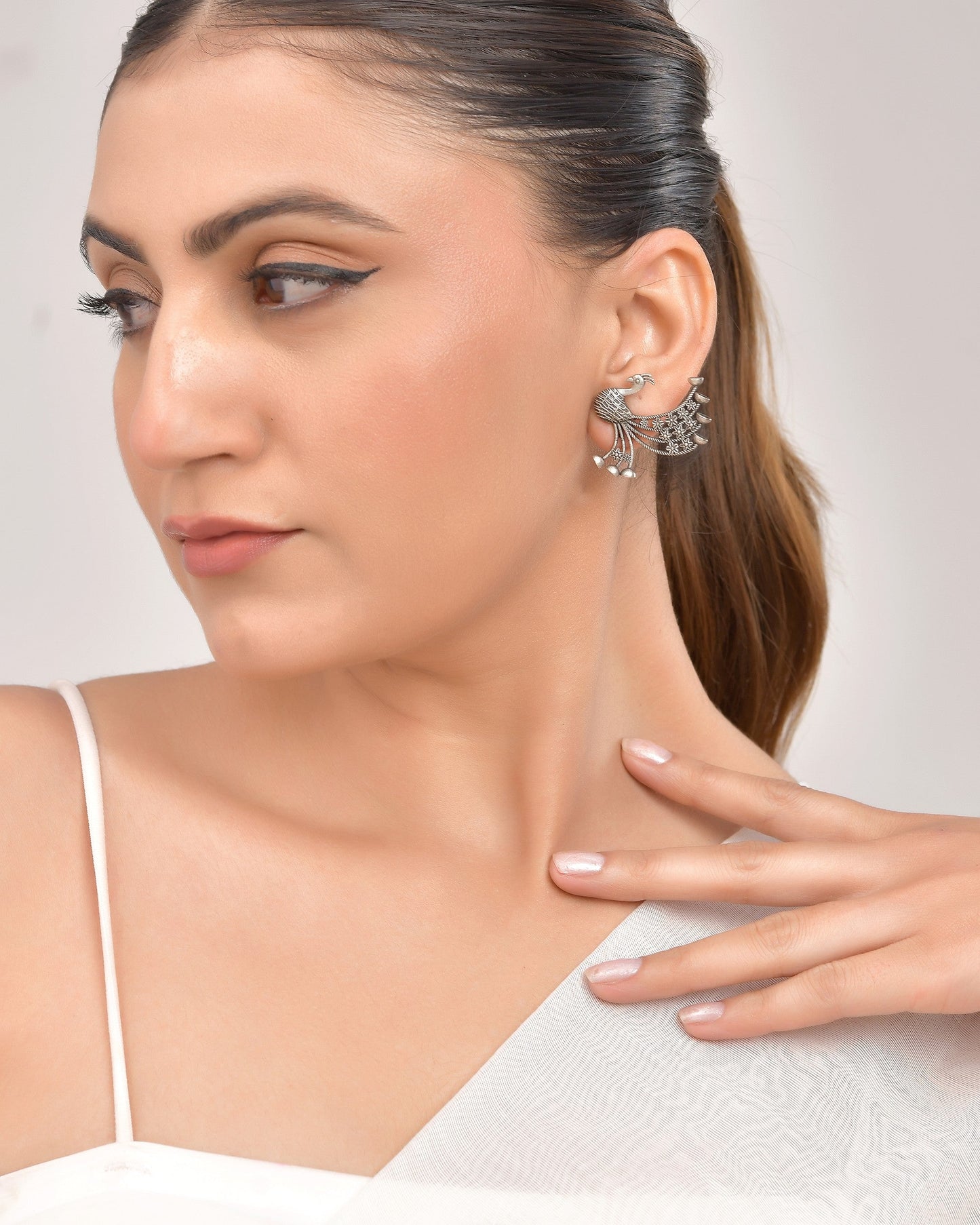 VOJ Silver Plated Dancing Peacock Shaped Studs Earrings - Swadesiicart