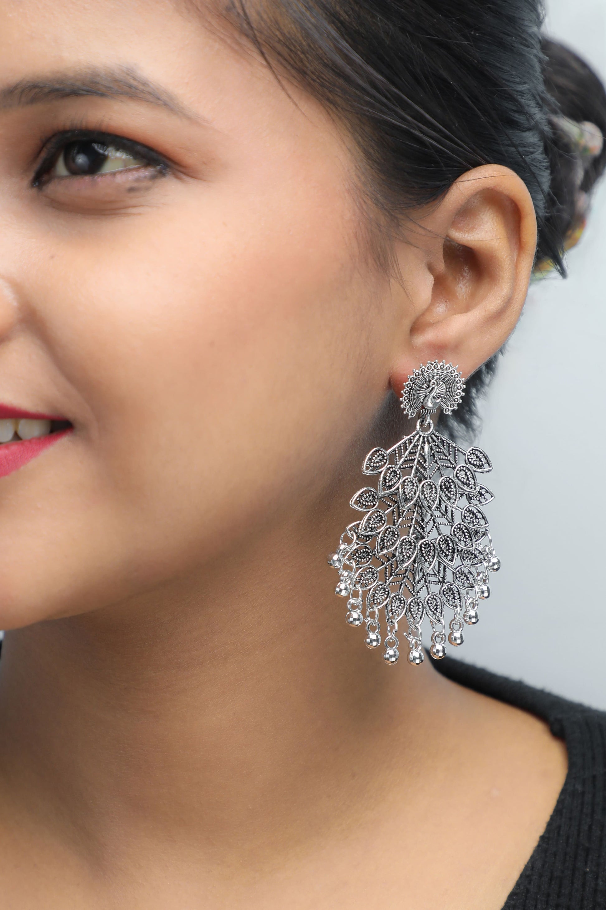 VOJ Silver Plated Oxidised Peacock Shaped Studded Earrings - Swadesiicart