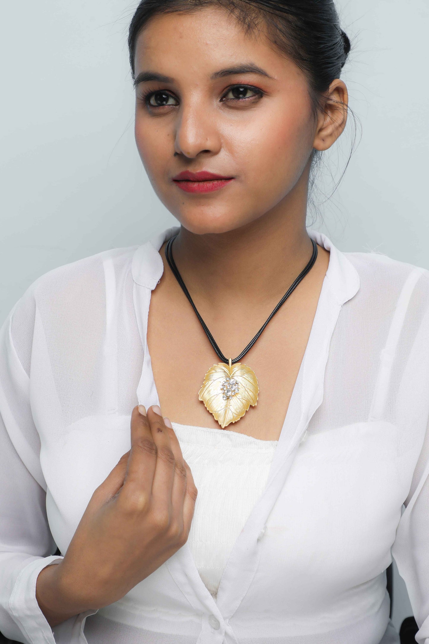 VOJ Leaf Shaped Gold Pandent With Black Necklace | Swadesiicart
