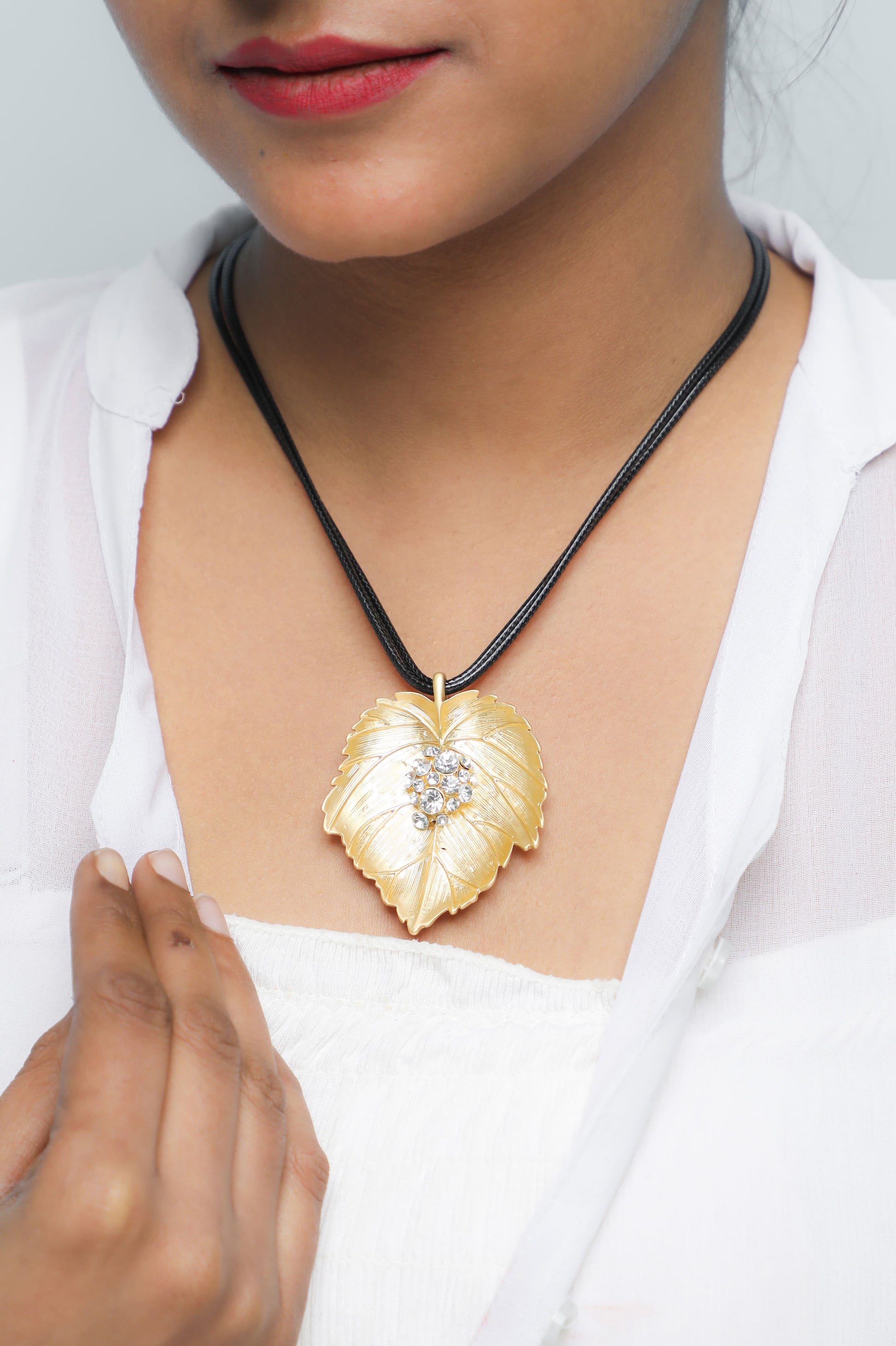 VOJ Leaf Shaped Gold Pandent With Black Necklace | Swadesiicart