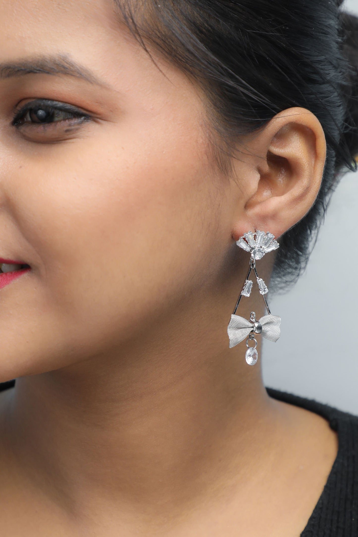 VOJ Silver Plated Stone Studded With Bow Triangle Shaped Earrings - Swadesiicart