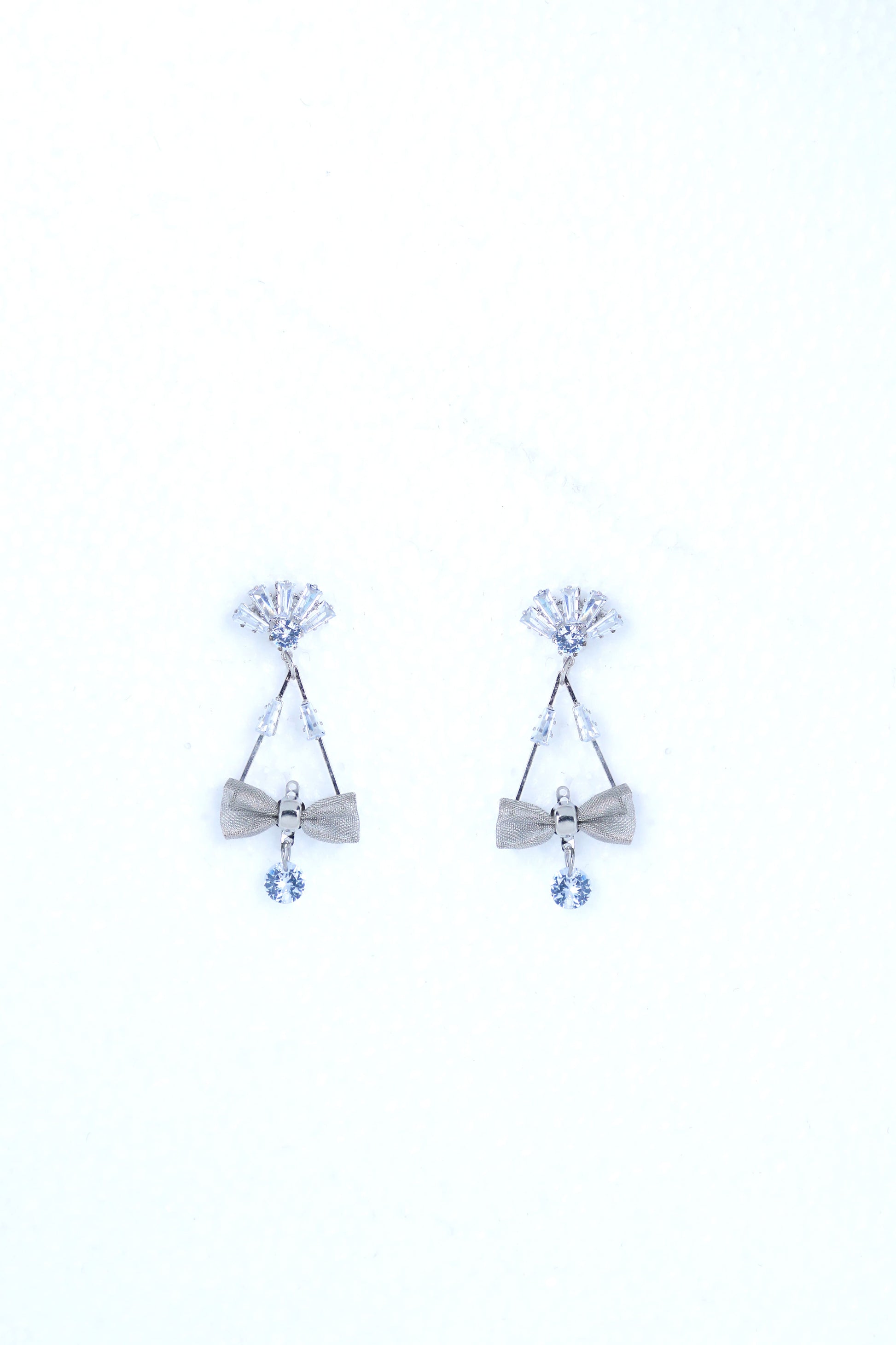 VOJ Silver Plated Stone Studded With Bow Triangle Shaped Earrings - Swadesiicart