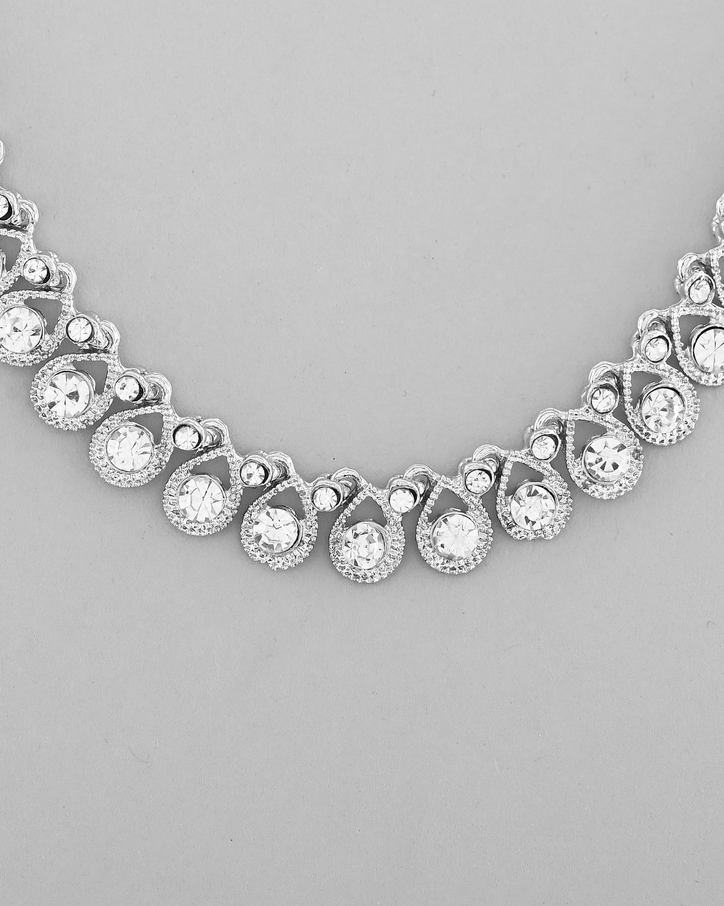 VOJ AD Stone Studded Silver Plated Necklace and Earrings Set - Swadesiicart