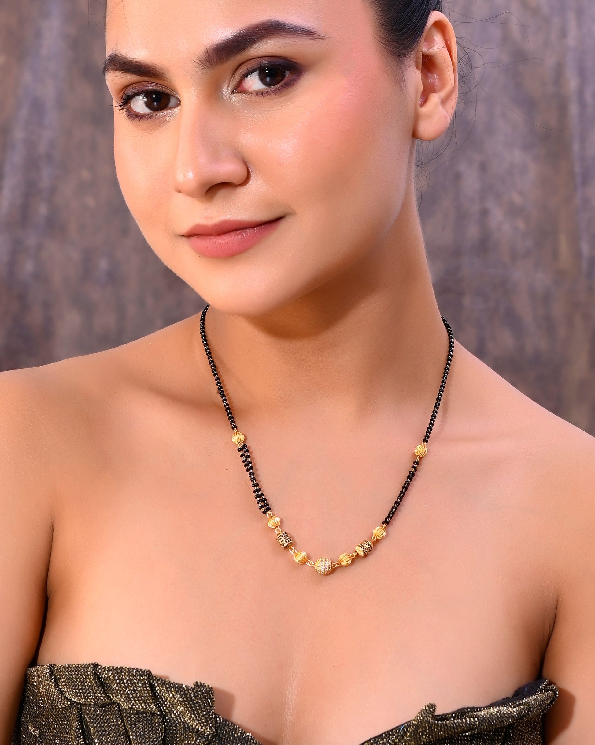 VOJ Gold-Polished Stone Studded Cricular shaped Mangalsutra - Swadesiicart