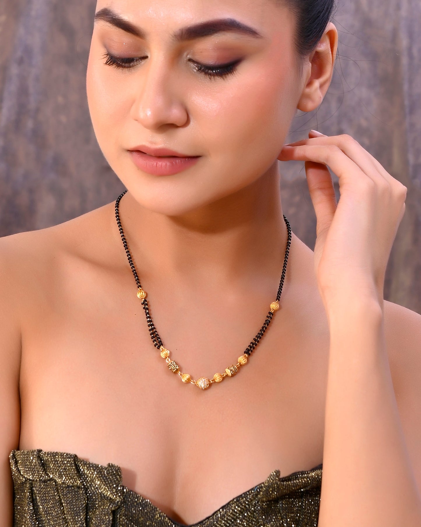 VOJ Gold-Polished Stone Studded Cricular shaped Mangalsutra - Swadesiicart