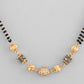 VOJ Gold-Polished Stone Studded Cricular shaped Mangalsutra - Swadesiicart