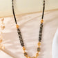 VOJ Gold-Polished Stone Studded Cricular shaped Mangalsutra - Swadesiicart