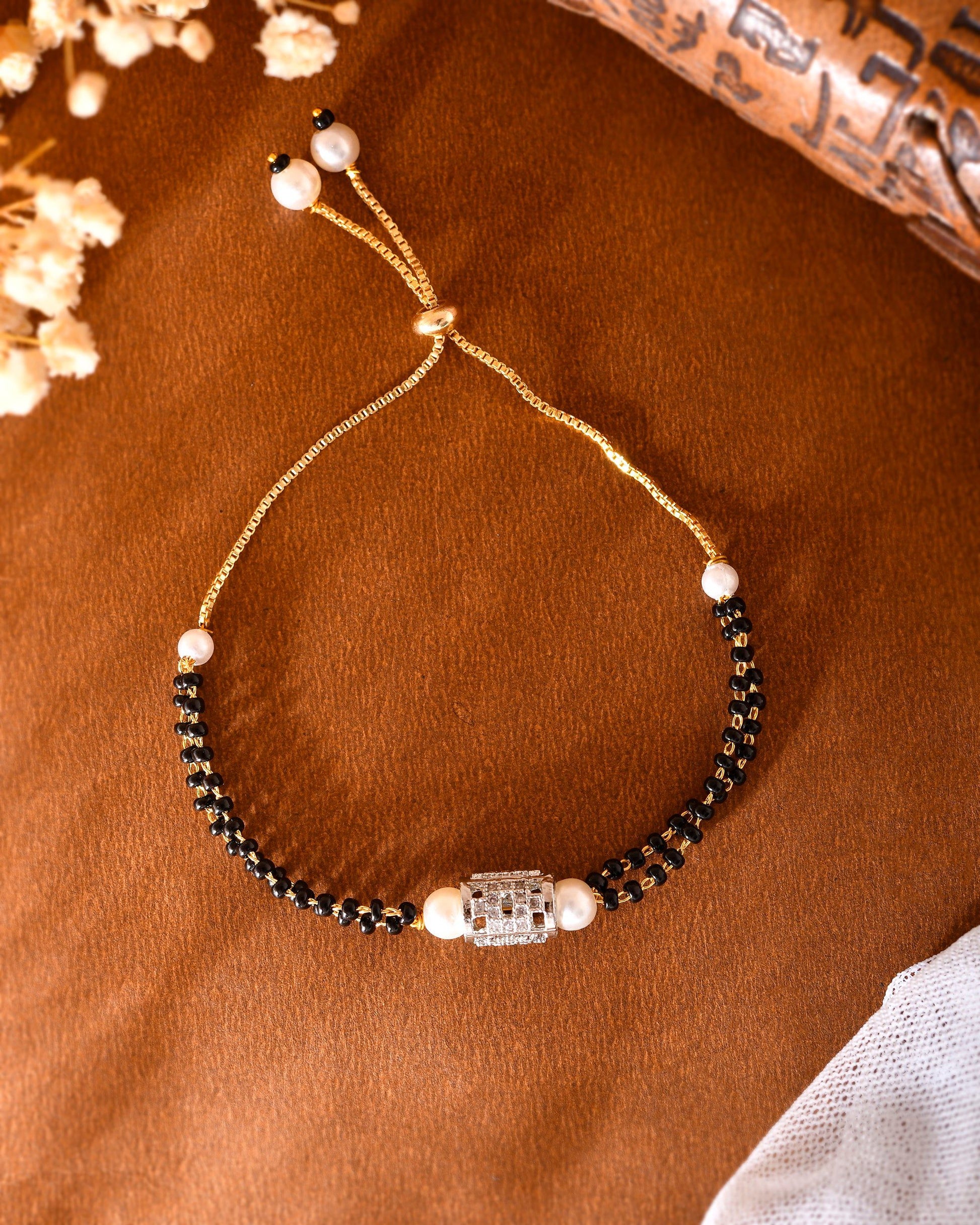VOJ Silver Plated AD Stone Studded Cylindrical Shaped Mangalsutra Bracelet - Swadesiicart