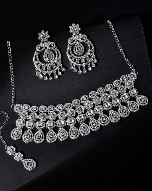 VOJ Silver Plated AD Studded Necklace With Earrings And Mangtikka Set - Swadesiicart