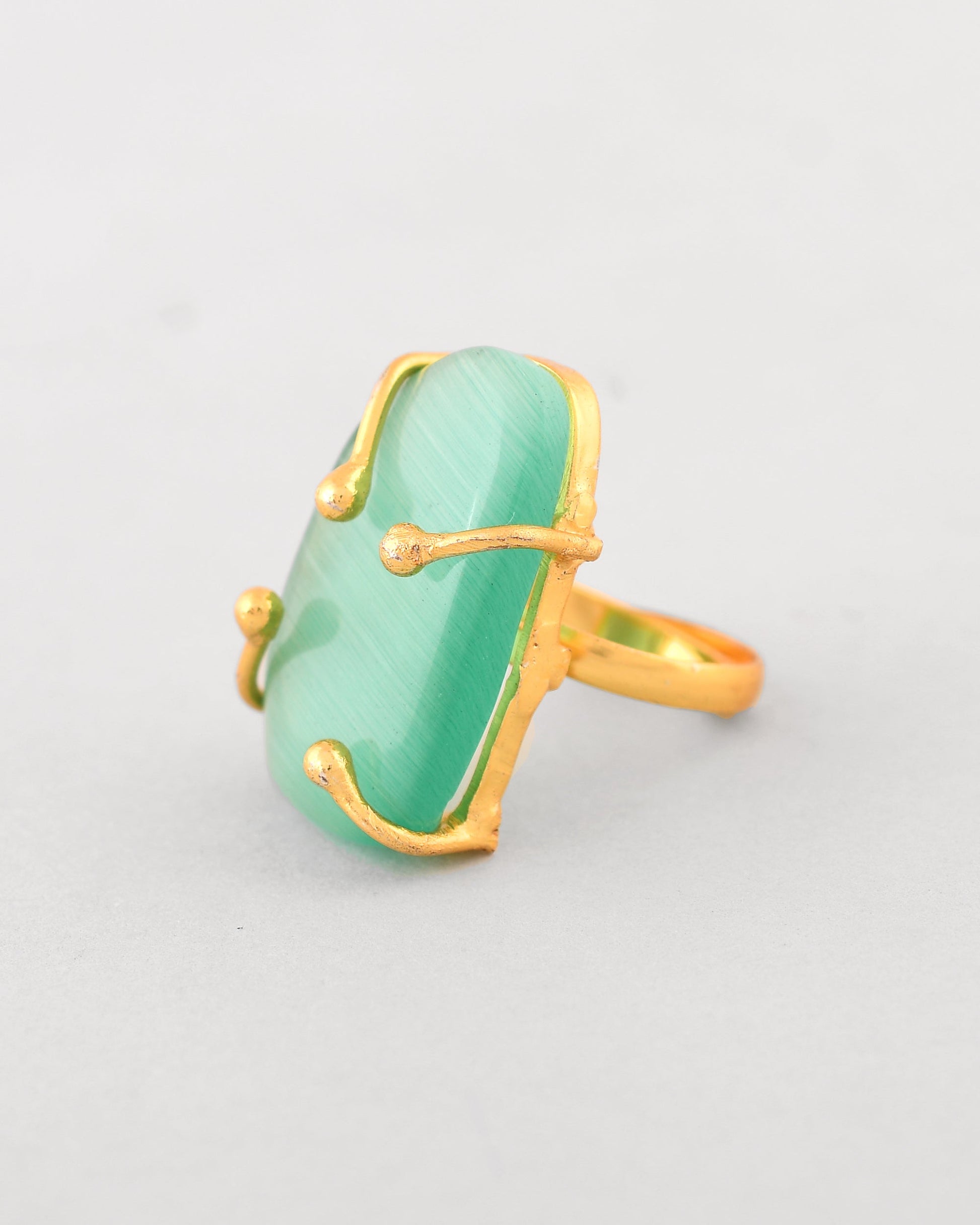 VOJ Gold-Polished Big Green Stone Studded Ring | Swadesiicart