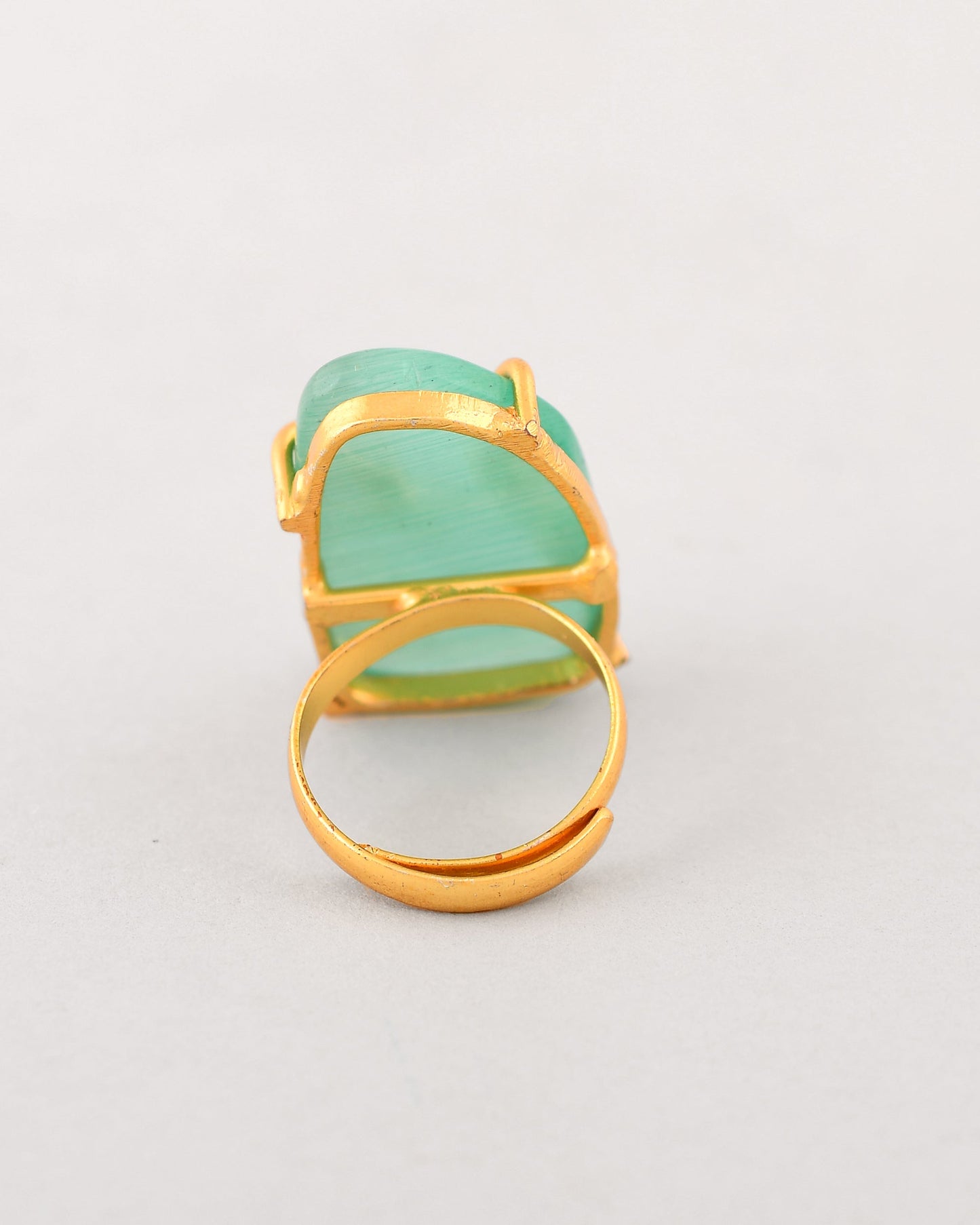 VOJ Gold-Polished Big Green Stone Studded Ring | Swadesiicart