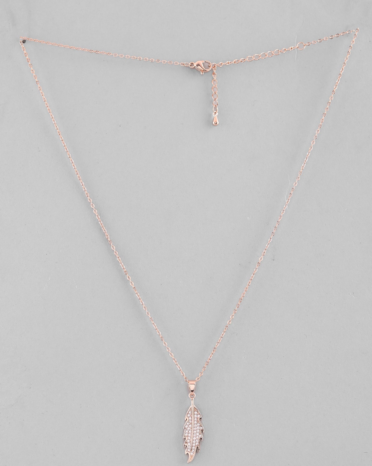 VOJ Rose Gold-Polished Chain With AD Studded Leaf Shaped Pendent | Swadesiicart