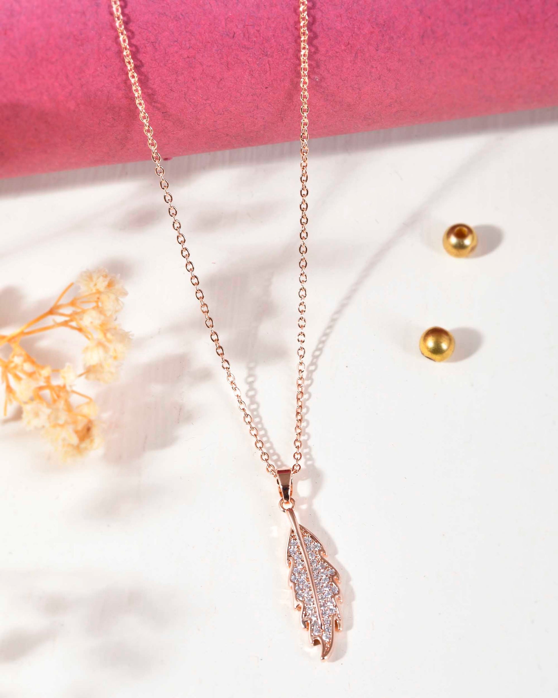 VOJ Rose Gold-Polished Chain With AD Studded Leaf Shaped Pendent | Swadesiicart