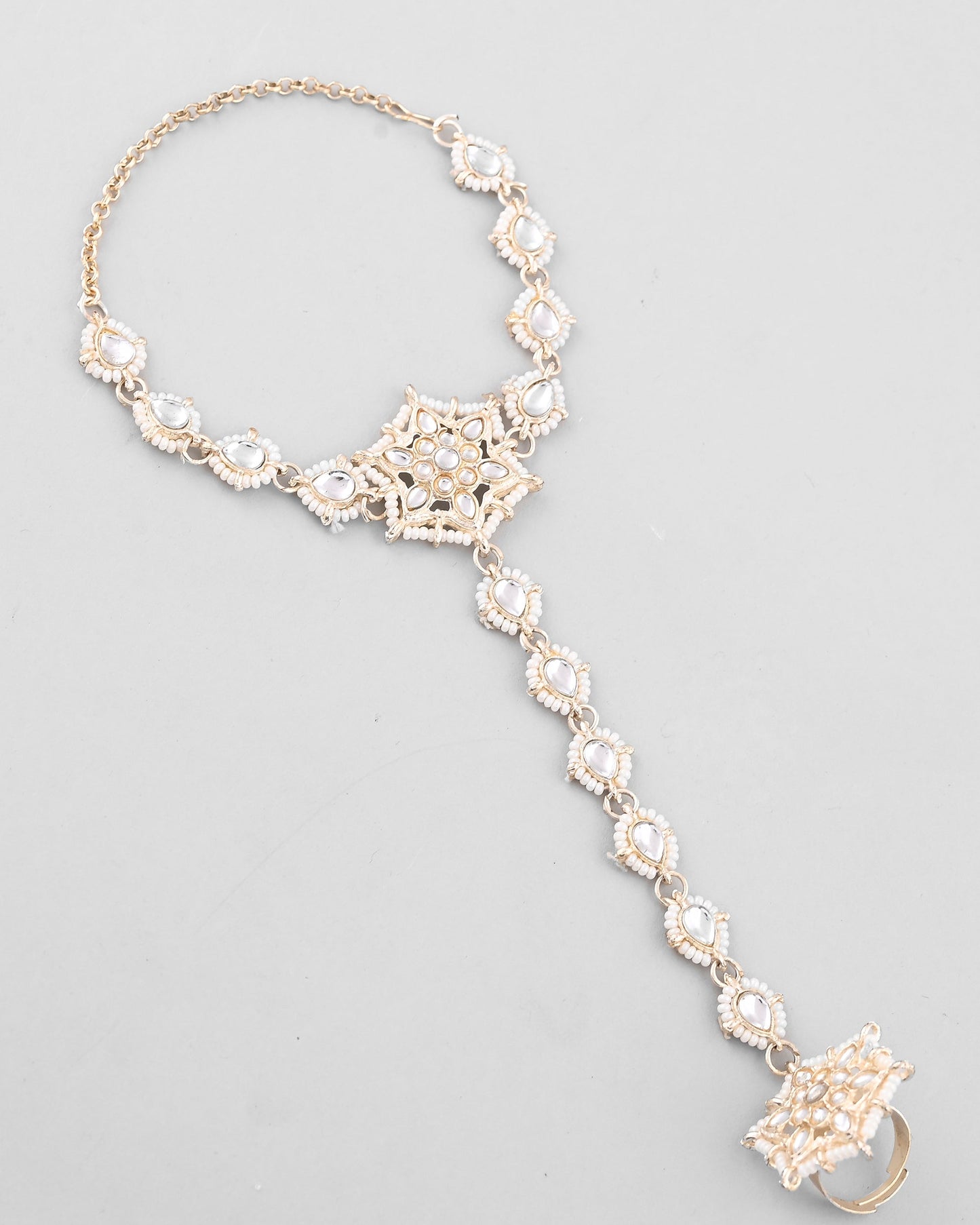 VOJ Gold-Polished Pearl And Kundan Ring Bracelet - Swadesiicart