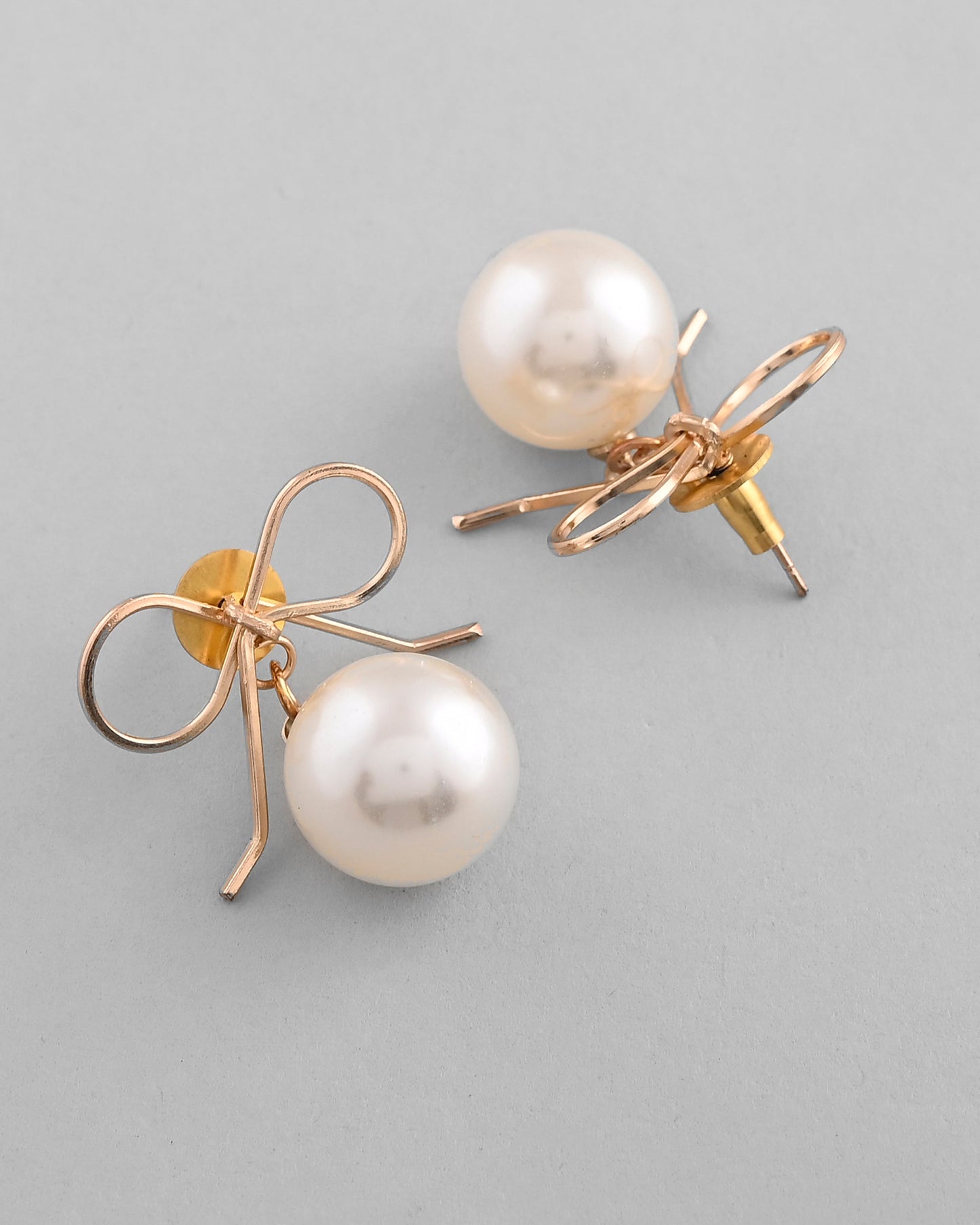 VOJ Gold-Polished Pearl & Bow Shaped Classic Drop Earrings - Swadesiicart