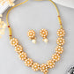 VOJ Gold-Polished Pearl Studded Floral Necklace And Earrings - Swadesiicart