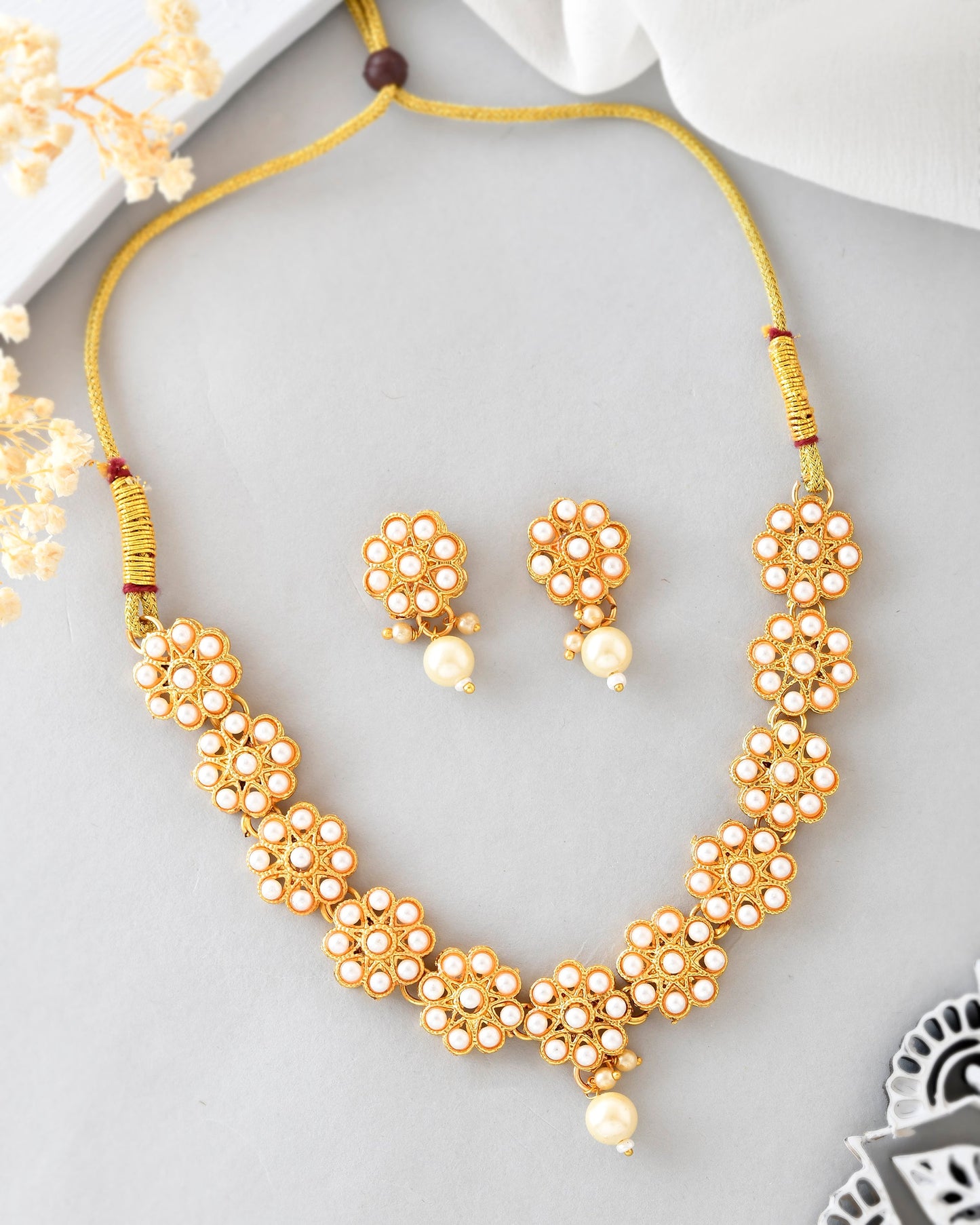 VOJ Gold-Polished Pearl Studded Floral Necklace And Earrings - Swadesiicart