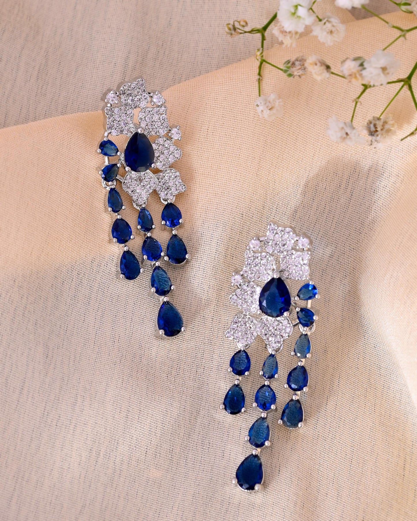 VOJ Silver Plated Ad And Blue Stone Studded Multi Layer Drop Earrings - Swadesiicart