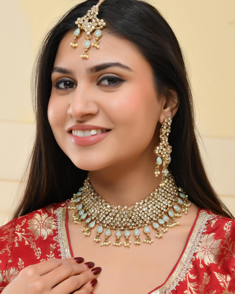 VOJ Gold And Sea Green Stone Studded Classic Choker Set | Swadesiicart
