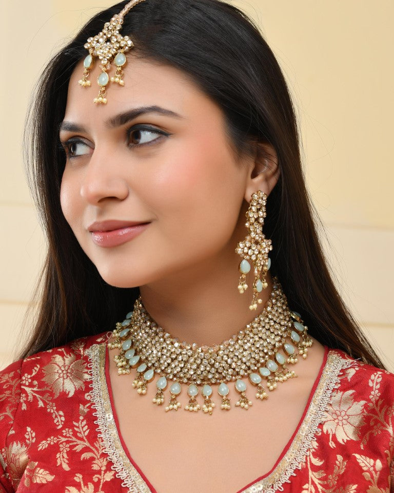 VOJ Gold And Sea Green Stone Studded Classic Choker Set | Swadesiicart