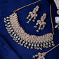VOJ Gold And Sea Green Stone Studded Classic Choker Set | Swadesiicart
