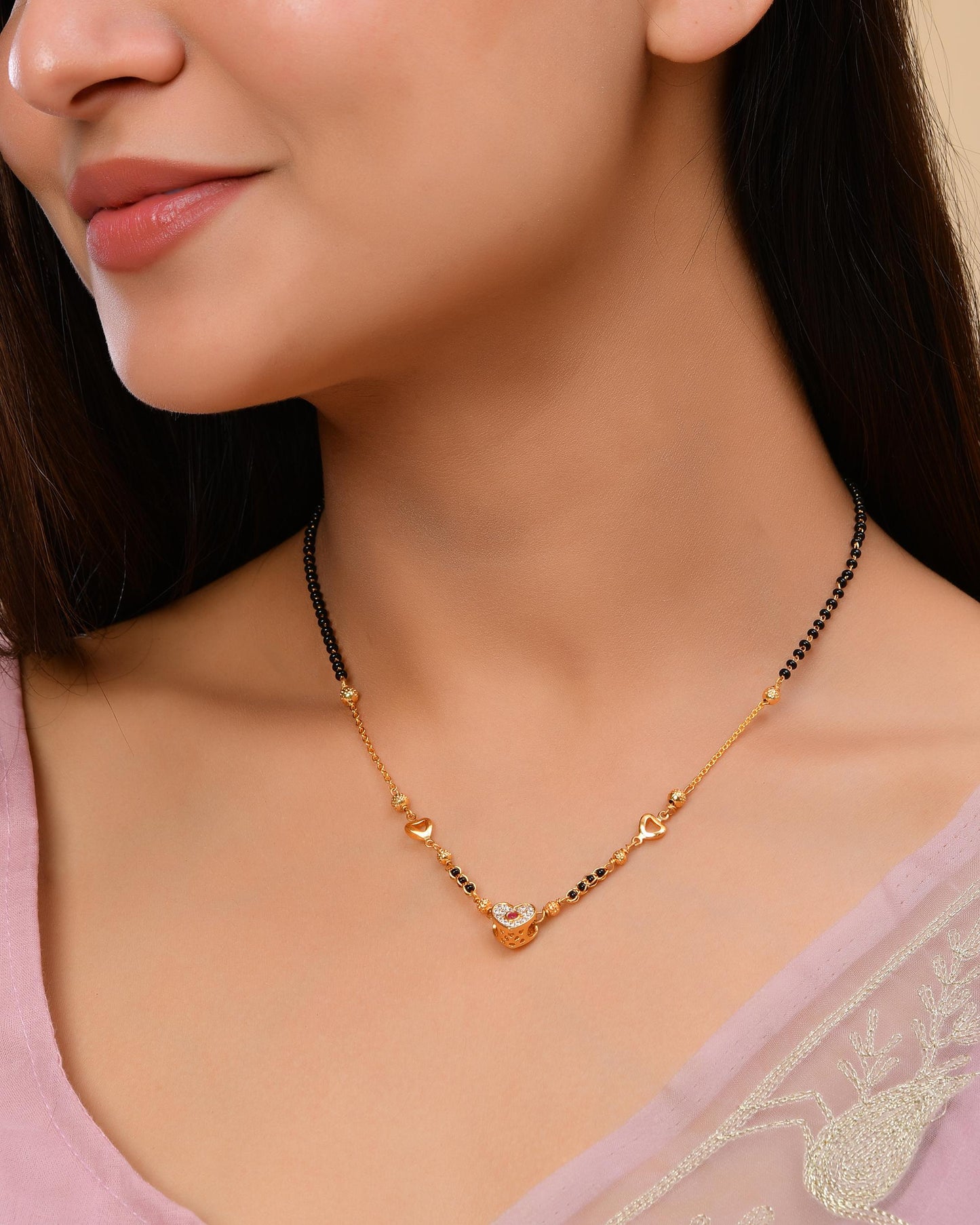 VOJ Gold-Polished Ad Studded Heart Shaped Mangalsutra - Swadesiicart