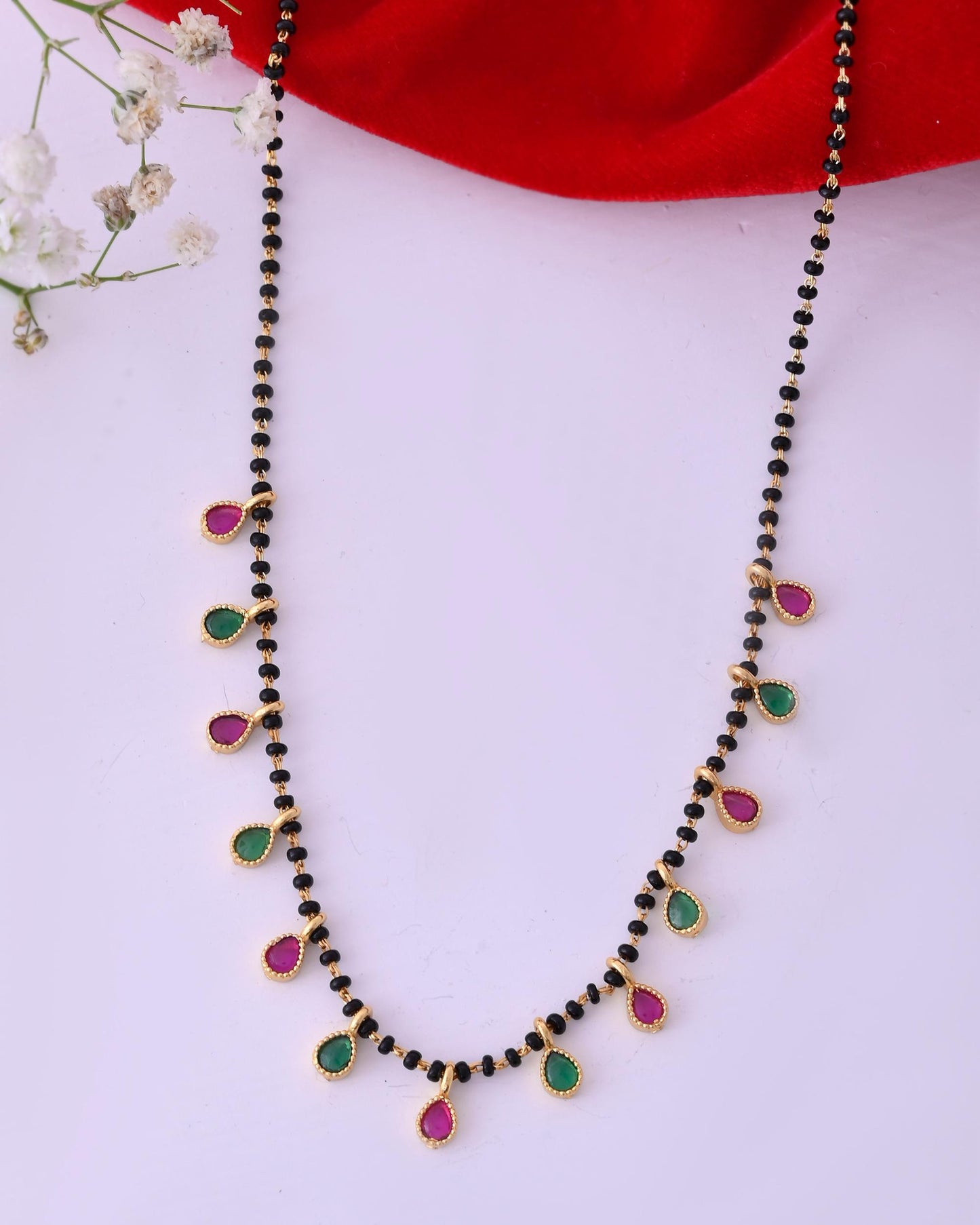 VOJ Gold-Polished Ad Studded Drop Shaped Mangalsutra - Swadesiicart